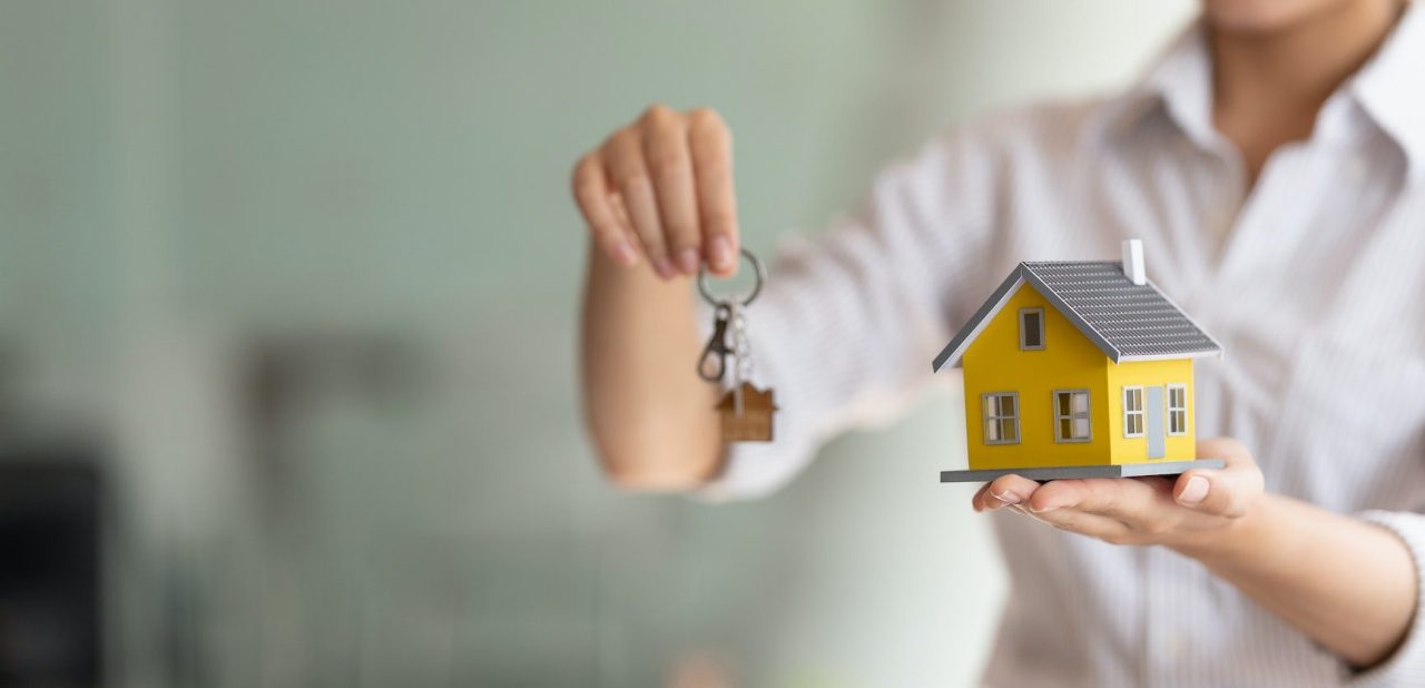 A homeowner receiving the keys to a new home